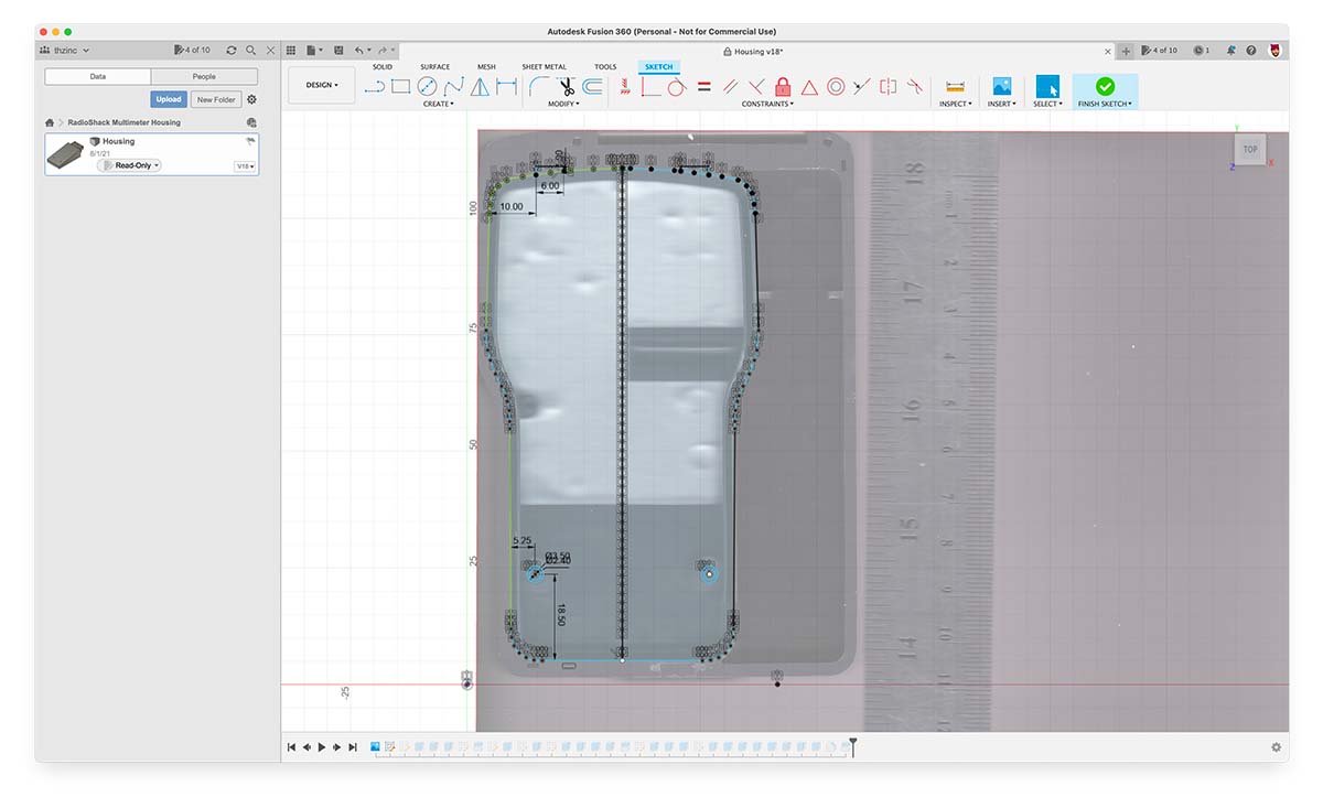 Screenshot of Autodesk Fusion 360 showing a traced profile of the meter overlaid on a photographic scan next to a ruler for scale