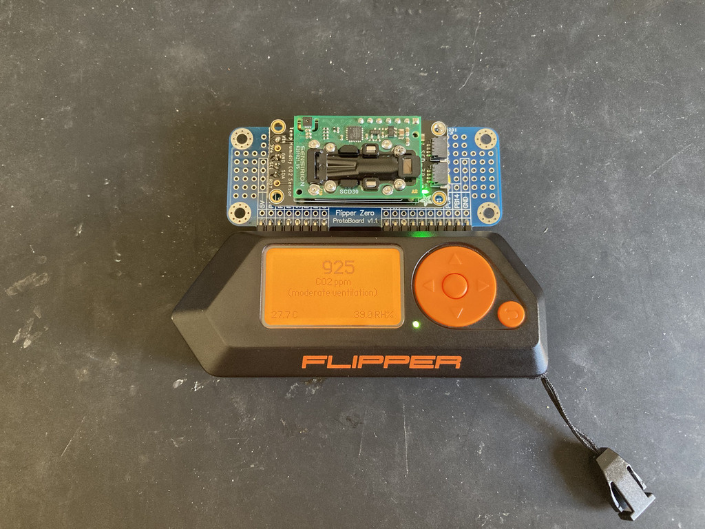 photo of the a CO2 sensor affixed to a Flipper ProtoBoard